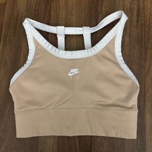 cream nike sports bra